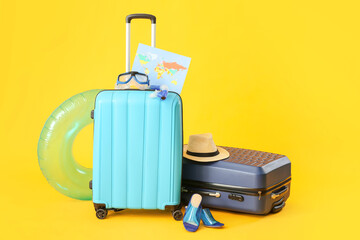 Packed luggage on color background. Travel concept