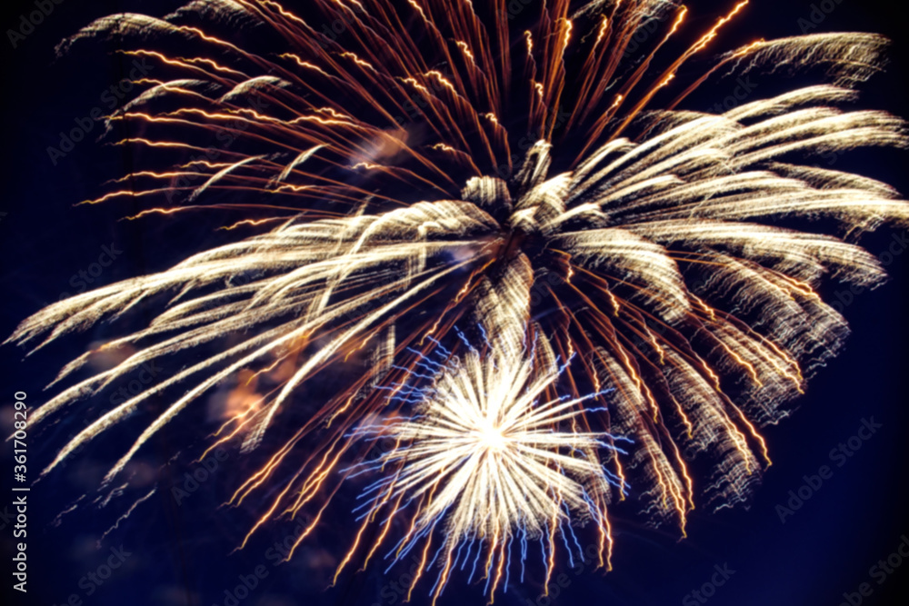 Wall mural blurred multi-colored flashes of fireworks exploding