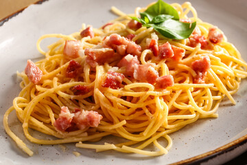 Plate with tasty pasta carbonara, closeup