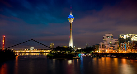 Rhine tower in the media port Düsseldorf by night