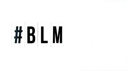 hashtag BLM BLACK LIVES MATTER text on a white background. Protest against the end of racism, anti-racism, equality