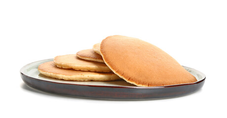 Plate with tasty pancakes on white background