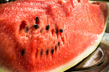 Ripe juicy red watermelon in a cut