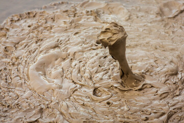 Boiling geothermal mud pool Rotorua New Zealand