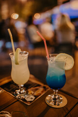 colored alcohol on the table in the cafe
