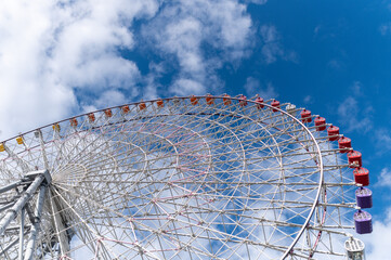 Ferris wheel on a sunny day.