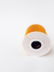 Car oil filter on a white background. Space for text. Isolate.