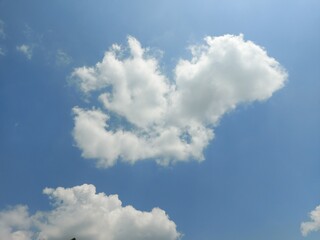 White clouds, indigo blue, colorful, natural background.