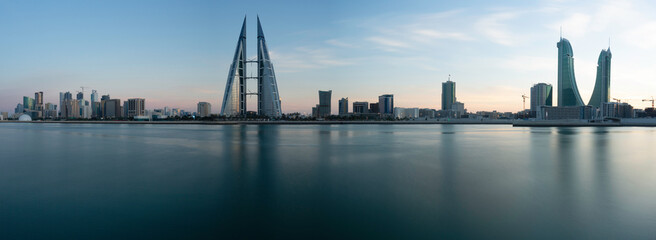 Naklejka premium The Bahrain Financial Harbour (BFH) commercial buildings are located next to King Faisal Highway