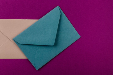 Colorful envelopes on a purple background.