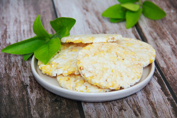 edible round dry cookies made from air rice and a corn
