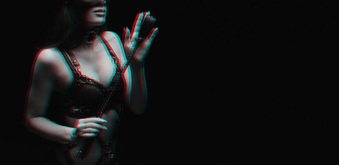 Sexy girl in a black beautiful bra playing with a whip. The concept of BDSM. Glitch, black and white. - obrazy, fototapety, plakaty