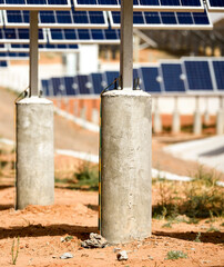 Solid cement columns under solar photovoltaic panels