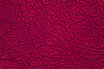 Red leather texture background, faux leather pattern. 