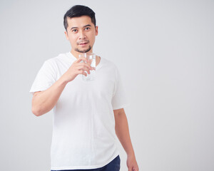 Young man with glass of water.