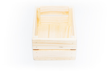 An empty wooden box. Made of pine and plywood, on a light white background.