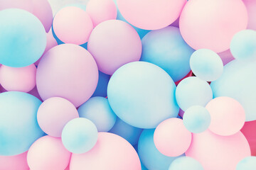 Fototapeta na wymiar pink and mint balloons photo wall birthday decoration. Colorful balloons background, punchy pastel colored and soft focus. 