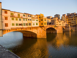 Naklejka premium Italia, Toscana, Firenze. Il Ponte Vecchio al Tramonto.