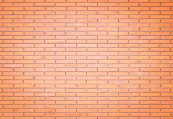 Background of wide old red brick wall texture. Old Orange brick wall concrete or stone wall textured, wallpaper limestone abstract flooring/Grid uneven interior rock. Home or office design backdrop.