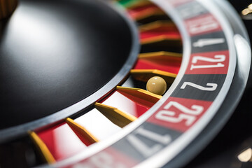 Obraz premium Casino. Black classic roulette with ball. Closeup. Shallow DOF