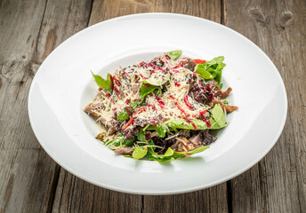 Salad of red pepper, arugula and fresh vegetables. Healthy eating.