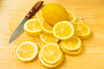 Yellow lemon Slice into pieces with ice cold