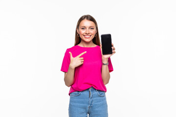 Naklejka premium Portrait of a joyful swoman showing blank screen mobile phone isolated over white background