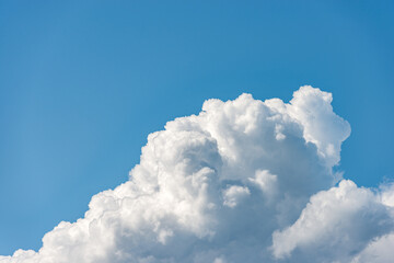 Naklejka na ściany i meble White clouds in the Blue Sky - Cumulonimbus