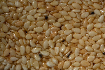 Sesame seeds bar with honey. Sesame seeds mixed with honey, Georgian sweet 
