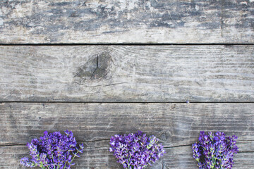 Lavender bouquets on old wooden background, rustic wood table with lavender, banner copy space
