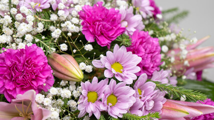 Light pink flower arrangement with chrysanthemum and carnation flowers. Floral concept. 