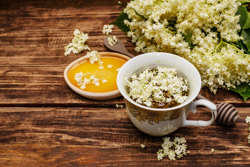 Tea from fresh elder flowers. Hot drink, honey, alternative medicine