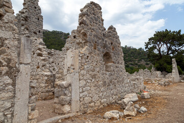 Naklejka premium Ruins of the ancient city of Olympos in Cirali village in Antalya, Turkey