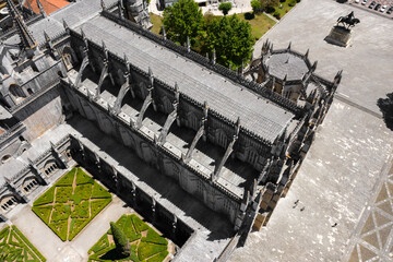 Batalha, Portugal - June, 29, 2020: Aerial View of Batalha Monastery. Dominican convent with cloister courtyard in Portugal. Manueline style architecture.