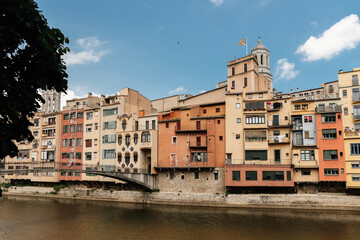 Naklejka na ściany i meble Old architecture and colorful houses by the river in Gerona, Spain