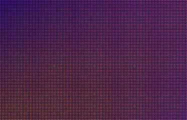LED screen gradient background, purple, orange and pink monitor dots. Close-up of the macrotexture of the display.