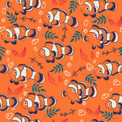 Seamless pattern with cute clown fish. Vector graphics.