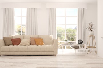 White stylish minimalist room with sofa and summer landscape in window. Scandinavian interior design. 3D illustration