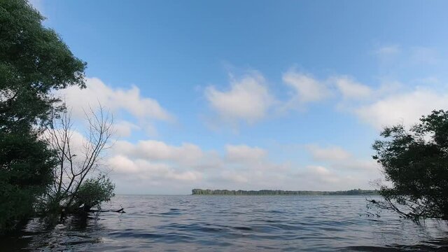 Clouds timelapse on Dniepr river early morning.