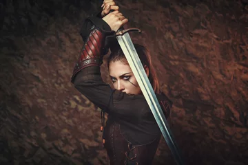 Fotobehang Fighter woman in parrying position with sword © captblack76