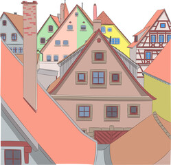 View of the facades and roofs of houses in Rothenburg ob der Tauber.