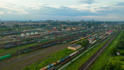 Obraz premium Large railway station with freight trains. Aerial view