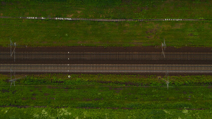 Fototapeta premium Large railway station with freight trains. Beautiful geometry of railway tracks