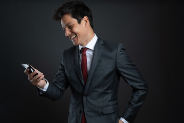 a man in a suit isolated on gray background