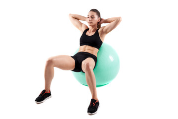 Fototapeta na wymiar Fitness girl working with gym ball
