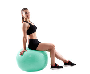 Fitness girl working with gym ball