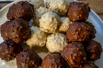 Three types of chocolate on the white background. Macro close of french chocolate. Fresh organic nut.