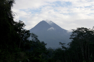 Naklejka na ściany i meble Mount Merapi is seen from the Kaliadem region, Yogyakarta, Indonesia