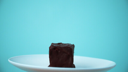 Chocolate cake on a white plate