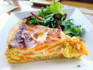 vegetable pie with cherry tomatoes, grilled peppers and courgettes with fresh eggs and fresh cream